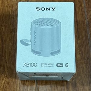 Sony SRS-XB100 Wireless Bluetooth Portable Lightweight Super-Compact Travel Speaker, Extra-Durable IP67 Waterproof & Dustproof, 16 Hour Battery, Versatile Strap, and Hands-Free Calling Copy